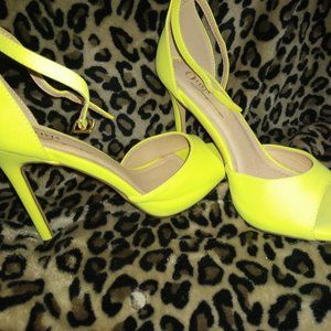 Size 9 NEON yellow ankle strap heels. NEVER worn!